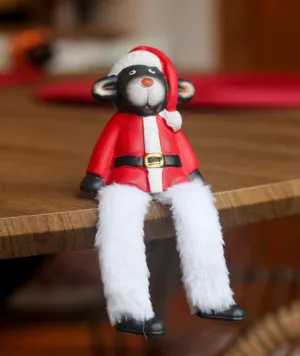 Ceramic Sitting Sheep Ornament With Festive Santa Outfit and Fuzzy Legs