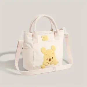 UME Winnie The Pooh Canvas Tote Bag - Cartoon Embroidered Crossbody Handbag with Honey Pot Charm, Zipper Closure, Dual Carry Handles, Canvas Lining, and Anime Animal Print Design - Perfect for Everyday Use